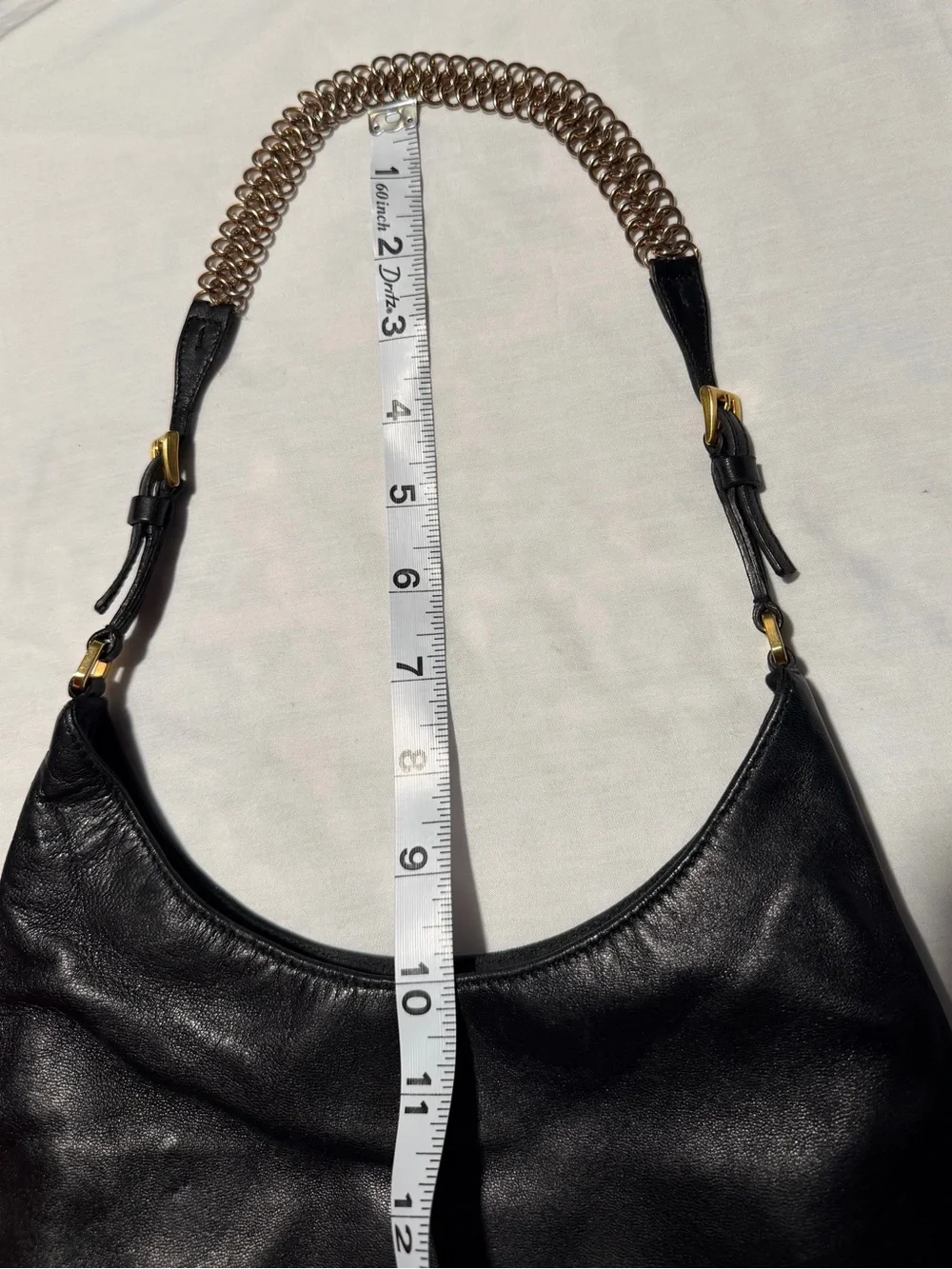 Prada Black Leather Hobo with Gold Chain Accent and dust bag .
